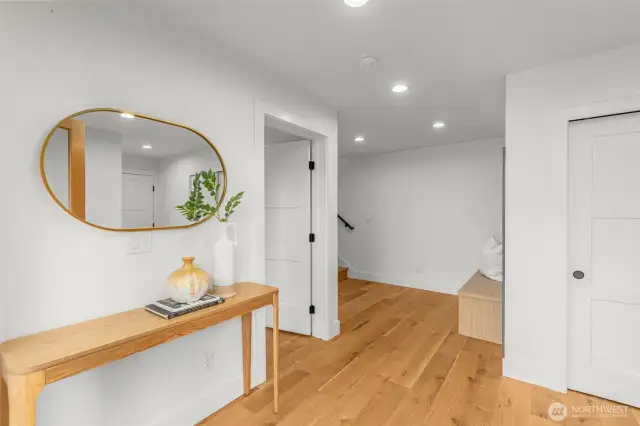 A bright, inviting entry hall sets the scene for everything this stunning home offers.