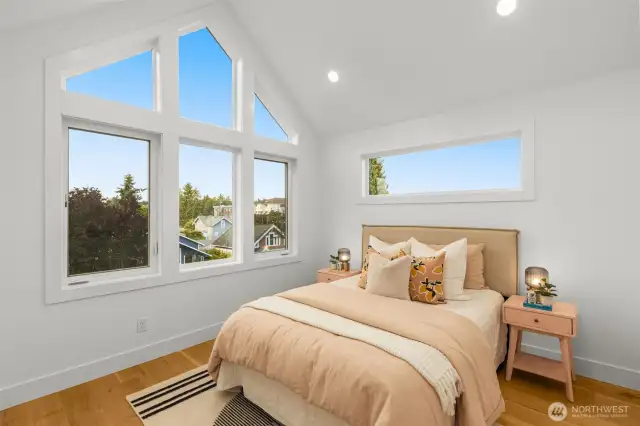 A dreamy retreat that feels like a modern treehouse with expansive windows wrapping you in sunlight from dawn to dusk.