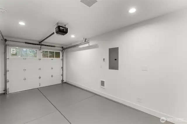Oversized garage with 40-AMP EV charger—ready for your electric vehicle.