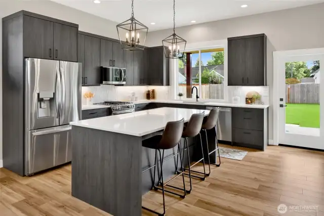 Even the little details shine—like the stylish pendant lights that add a perfect touch of character and charm to the kitchen. Every finish was thoughtfully chosen to blend function and beauty.