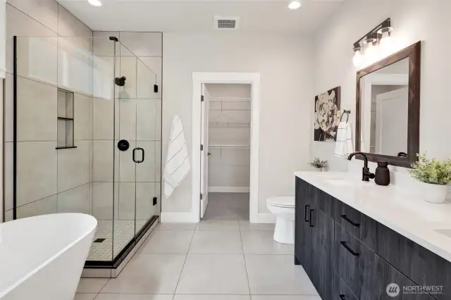 What a bathroom! You’ll love unwinding here with luxurious touches and plenty of room to relax and prepare for the day!