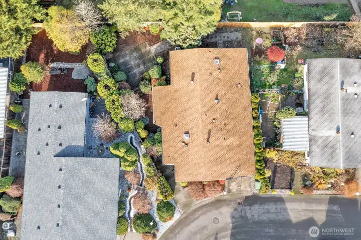 Aerial view of the home. Positioned at the North border of the community.