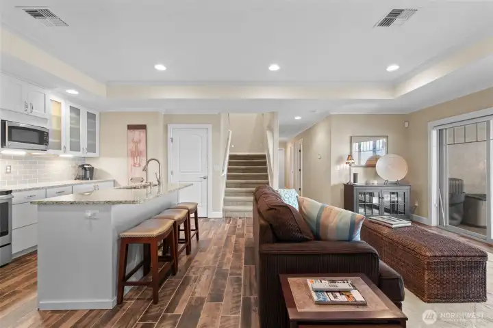 The family room has a full kitchen making this a perfect arrangement for hosting guests or accommodating a large family.