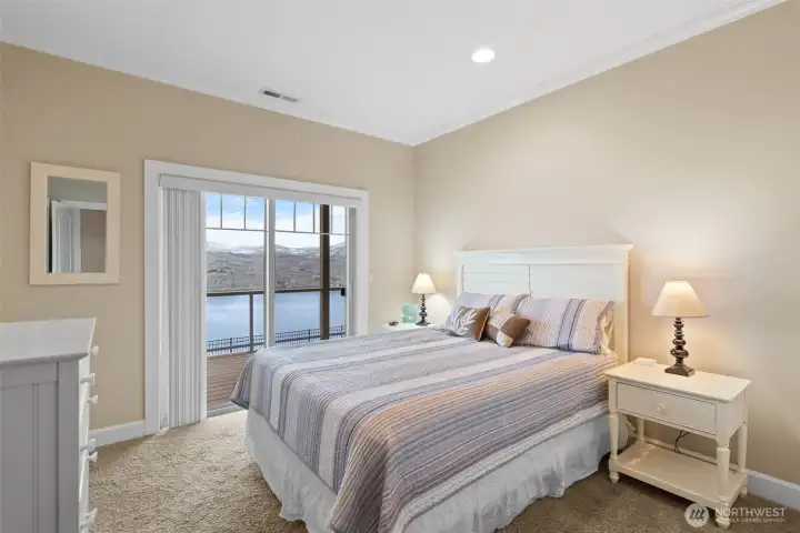 Guest bedrooms 3 & 4 are located on the west end of the lower level. Both of them have sliders to the view deck. This is guest bedroom 3.