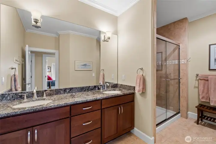 This is the 3/4 bath directly across the hall from guest bedrooms 3 & 4, featuring dual sinks and a walk in shower.