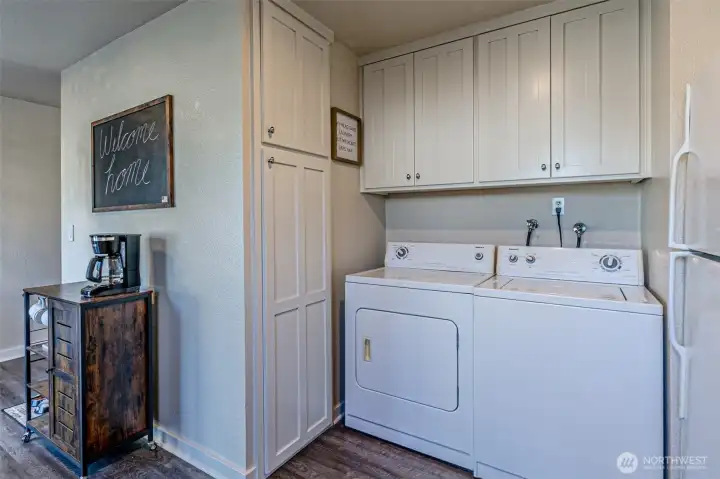 Roomy pantry next to washer and dryer