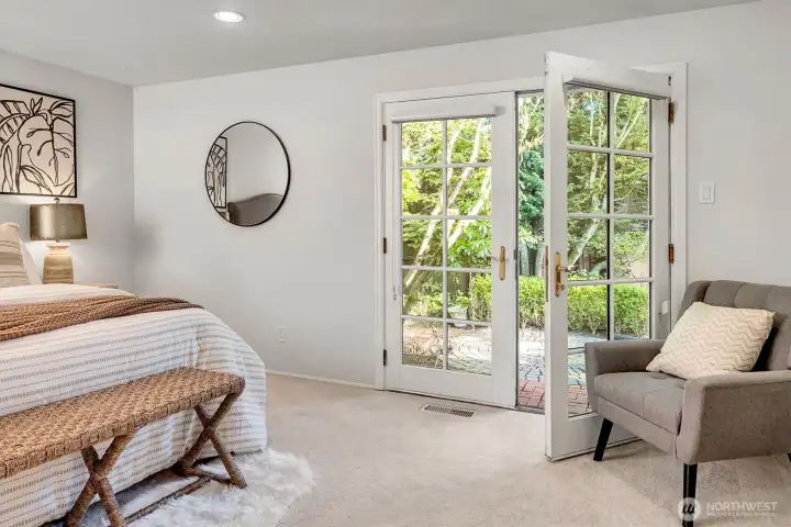 Another set of French doors leading out to the grand backyard.