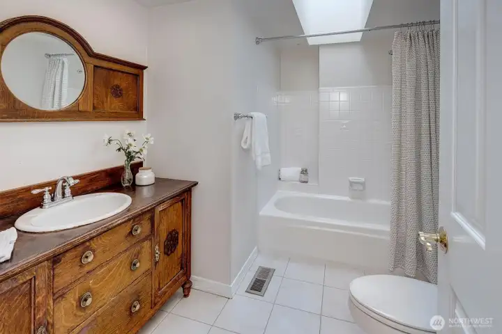 Guest bathroom with skylight.