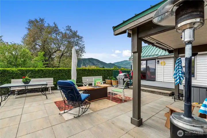 Enjoy privacy from every direction on this patio.