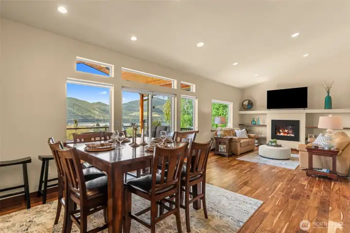Open concept dining and living area.                 Enjoy the view from the dining table that seats 8