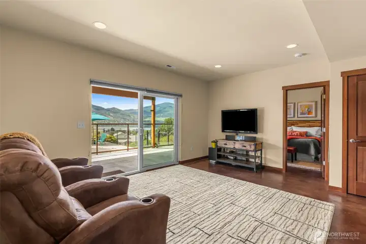 Lower level great room that steps out to the lower patio and pool.