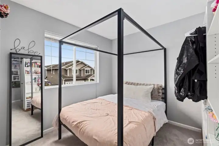 The second half of the 3rd bedroom. There are wardrobe-style shelves to the right, making this feel like its own room!