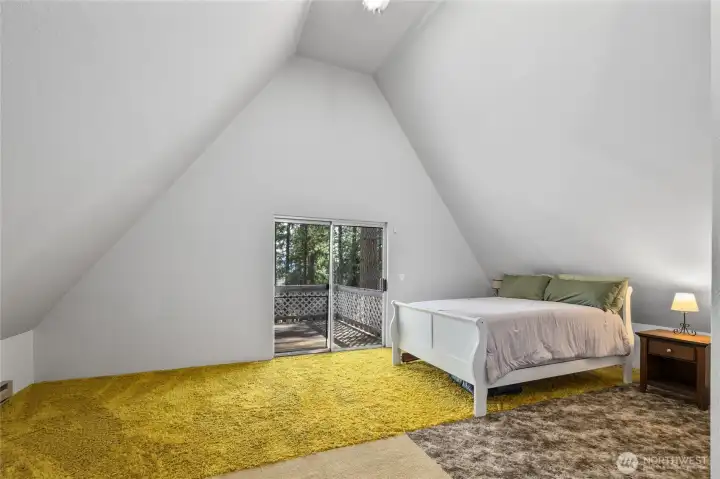 Bedroom 3 upstairs with private balcony.