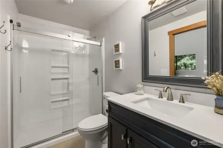 New 3/4 bath upstairs off the bonus room.