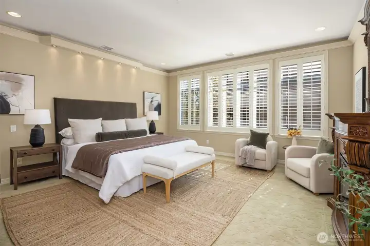 Retreat to the luxurious primary suite with a fireplace and 5 piece bath.