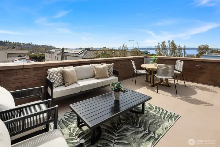 Smell the fresh air from the beach and water a block away.