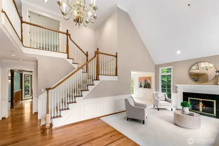 Beautiful two story entry with vaulted ceilngs and hardwood floors