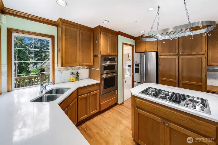 Kitchen with prep sink and solid honey oak cabinets