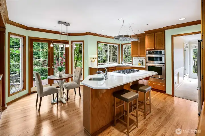 French doors off casual dining, center island with bar seating