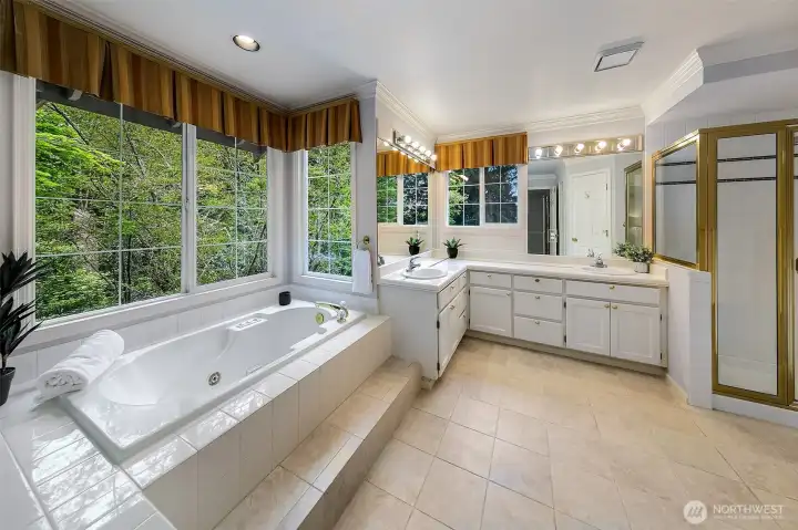 Huge 5-pc primary bath with walk in closet and separated water closet.  Linen storage too!