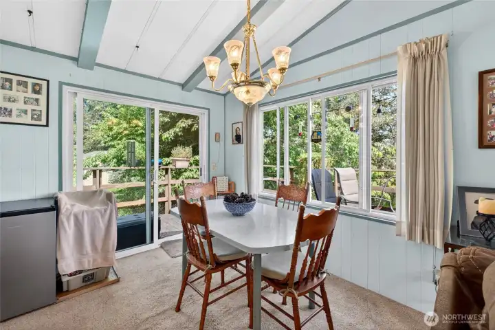 Good sized dining room w/slider leading to wrap around deck.
