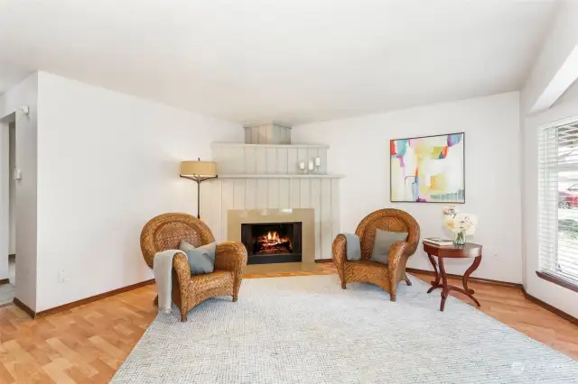 Living room with wood burning fireplace