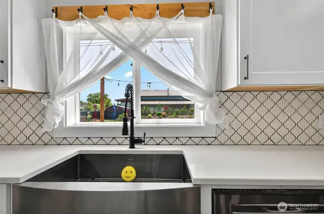 Beautiful Brushed nickle stainless steel Country sink matches the appliances for a beautiful cohesive appearance.