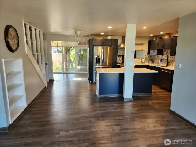 Looking from living room to kitchen and sun rom