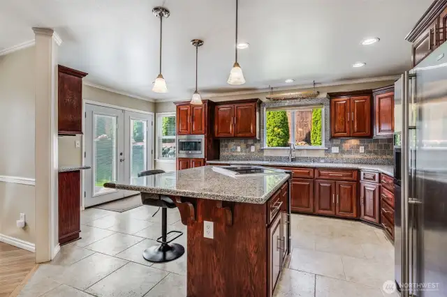 Custom cabinets throughout. Pull out drawers in most cabinets