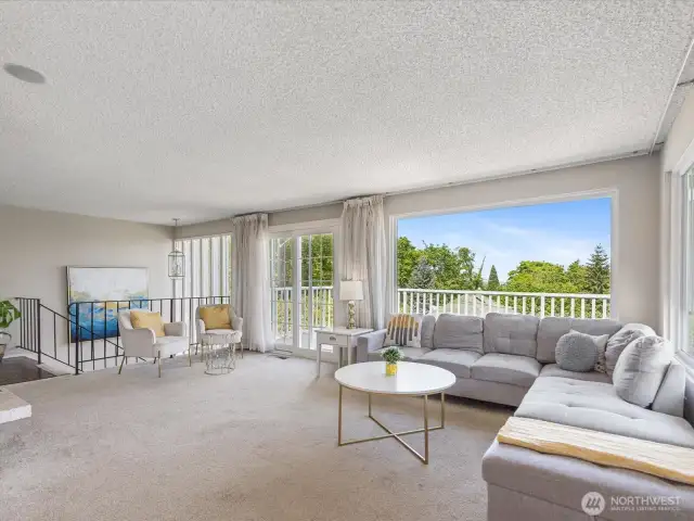 Family room with sliding glass doors to deck and big big views.