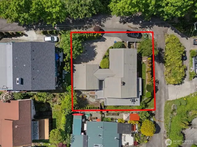 Wonderful home with courtyard entry, wrap around decks, and a level yard.