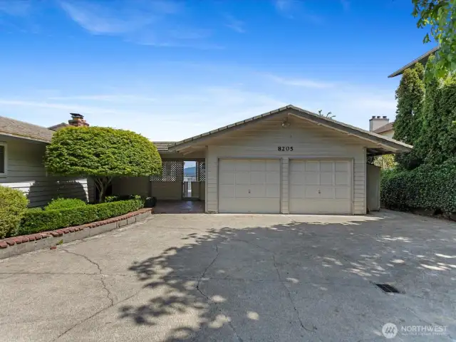 Welcome Home!  Large detached garage with courtyard parking.