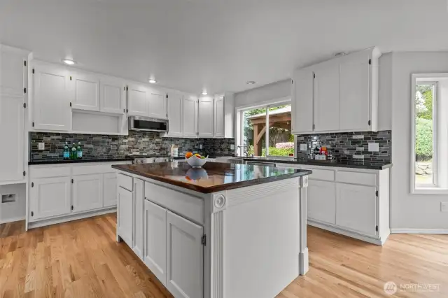 Chef's Kitchen with Center Island &  Stainless Steel Appliances