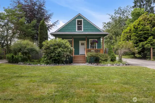 Charming curb appeal with mature landscaping