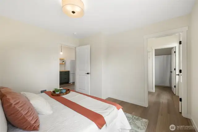 Primary bedroom includes a walk-in closet offering ample storage and easy organization