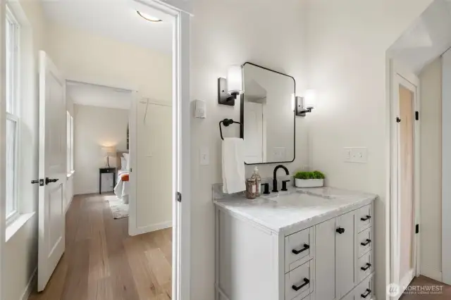 Beautifully updated bathroom with sleek fixtures, contemporary finishes, and a fresh, modern feel