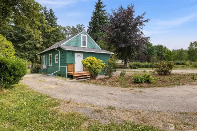 Expansive .64 acre property offers endless possibilities for outdoor living, entertaining, or gardening