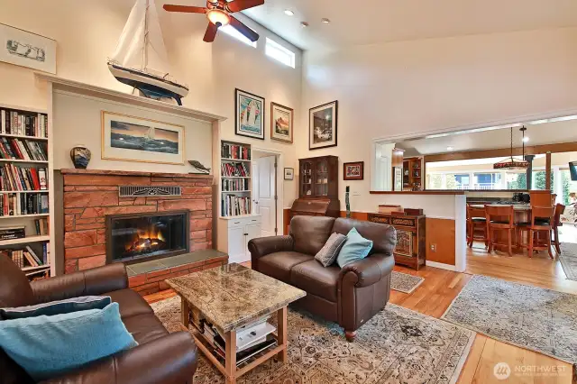 High windows flood the living room with natural light.