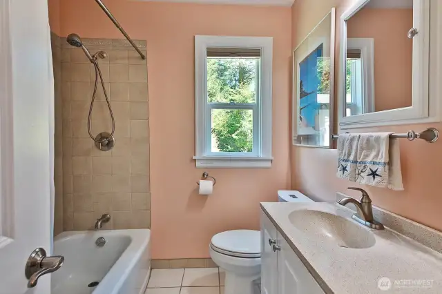 Full guest bath near the two additional bedrooms.