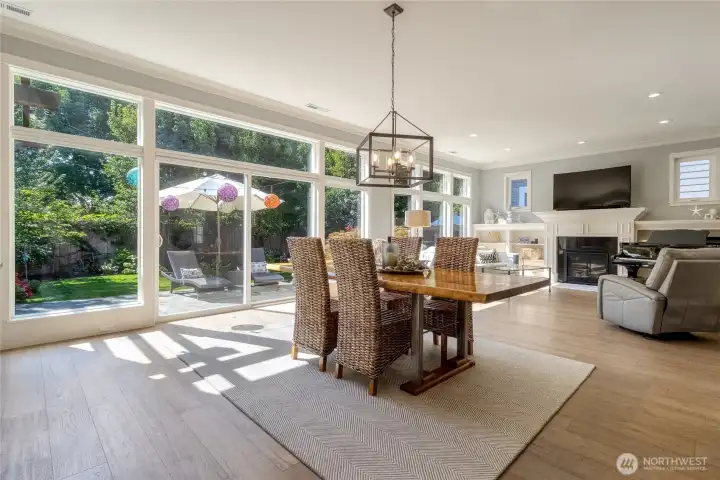 Walls of glass to the private fully fenced backyard Oasis