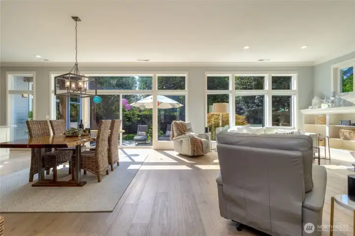 Open Living room, Dining & Kitchen with access to Private back yard