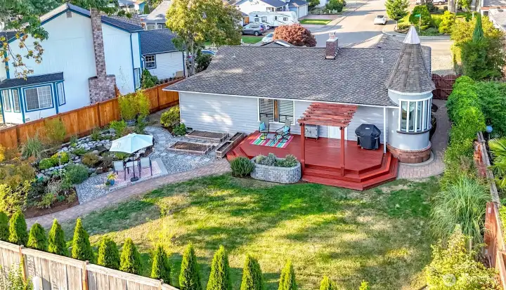 Outdoors is an oasis with deck, patio & a peaceful water feature! There is RV parking too.