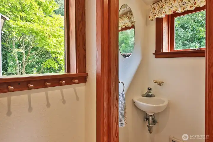 Perfect spot for a half bath, right off the mud room where you can leave your boots and coats. We never loose the thread of beautiful craftsmanship in this home, even in the laundry room!