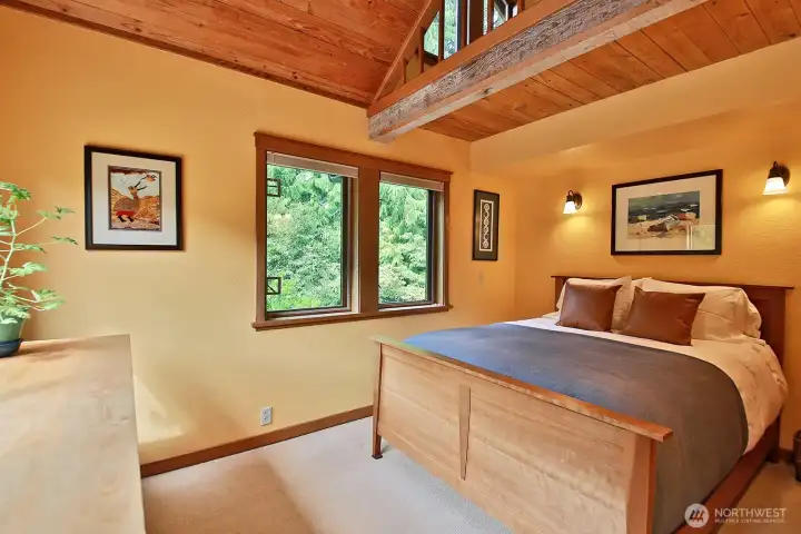 The Primary Bedroom with loft and stairs to the 3rd level (office & medication space).