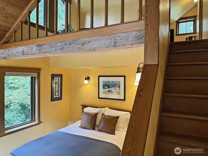 Up the stairs to a loft area and office with additional storage space.