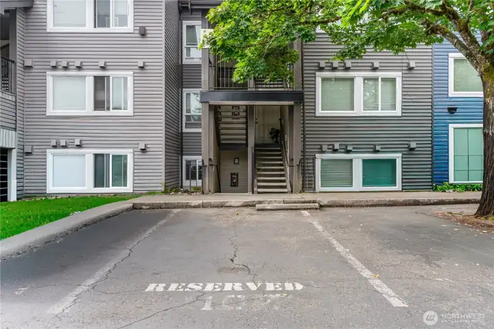 Assigned uncovered parking spot right out front