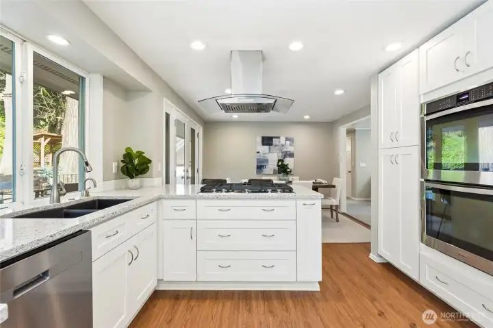 Fully Remodeled Kitchen with Quartz Counters, Large Island and Stainless Appliances in Forest Park Everett Home