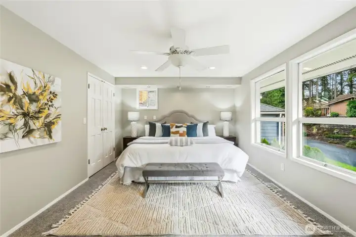 Primary Suite with Ceiling Fan, Plush Carpet and Natural Light