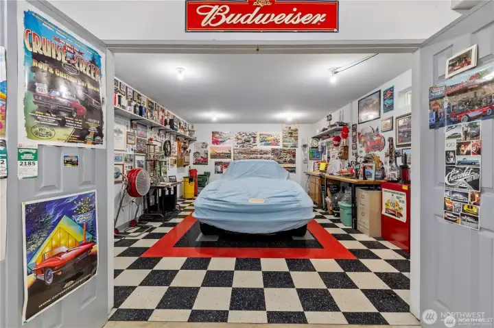 The tandem 3rd car garage has main doors with a side access door. Perfect as a temperature controlled showroom - or an amazing workshop!