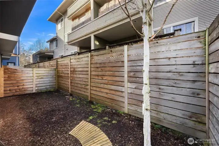 This secure, fully fenced back yard is yours to enjoy. Could add pavers, a patio/barbeque or just run space for your pup.
